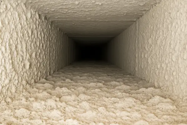 the inside of a very dirty AC duct